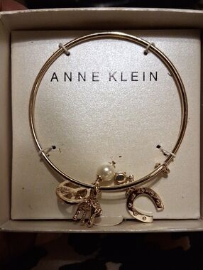 Anne Klein Gold Tone Charm Bangle with Pearl and Horseshoe